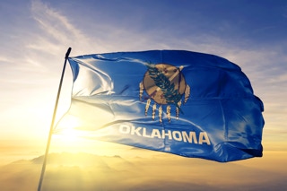 Oklahoma flag Jeanetta Calhoun Mish Poet Laureate poems Oklahomans Directive We are Thankful New York Times